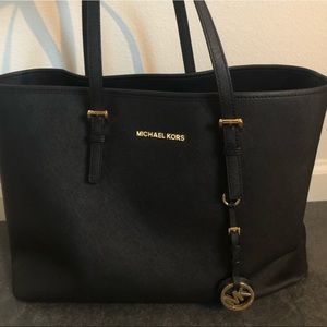 Black leather Michael Kors tote bag